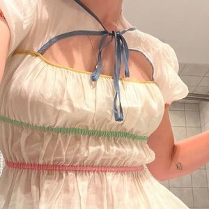 LOOKING FOR SOMEONE SELLING THIS ANTHROPOLOGIE TOP.